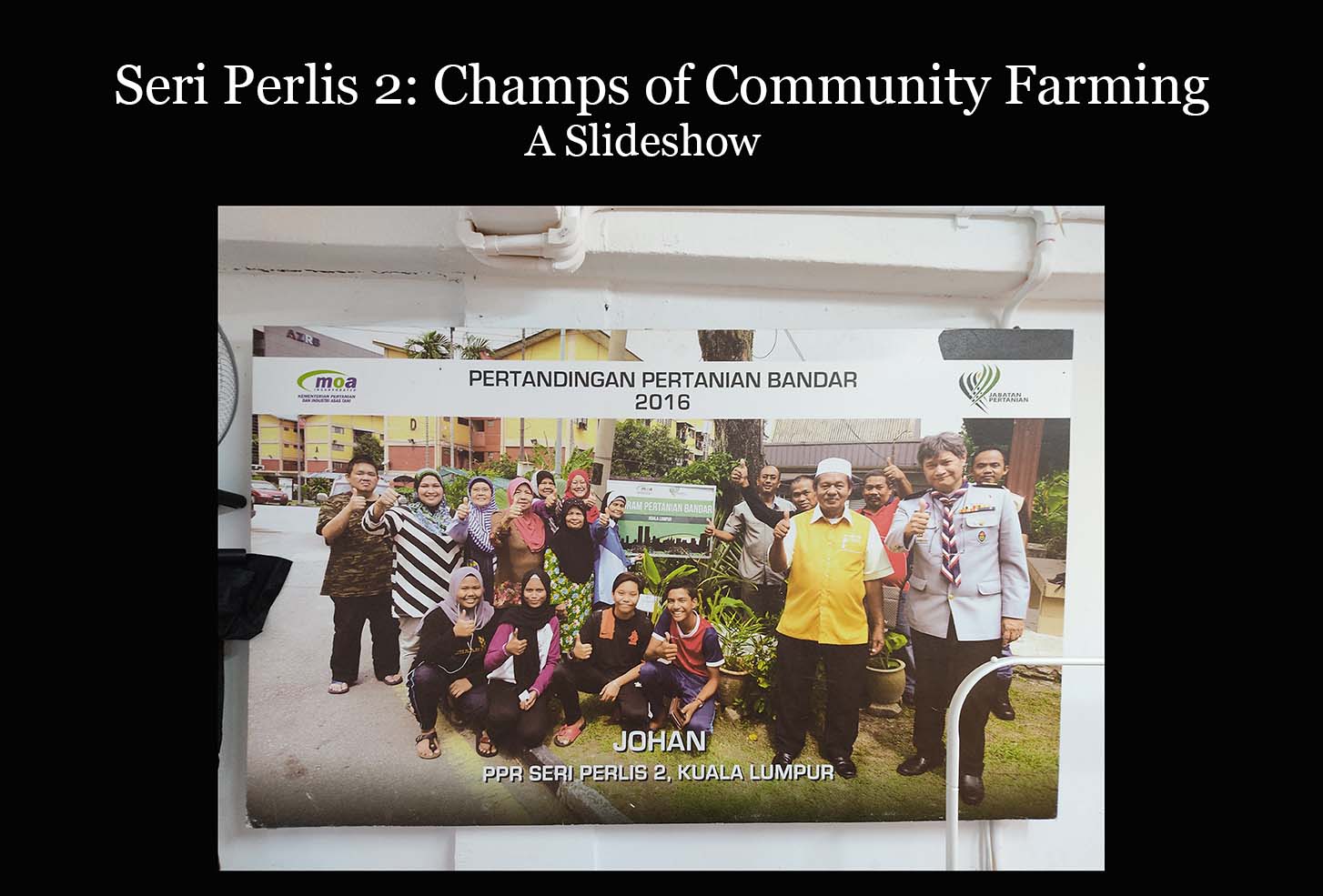 An award for community farming is framed in the Seri Perlis 2 PPR. (Tan Kai Ren)
